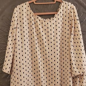 Used.  Color is more cream, black and taupe